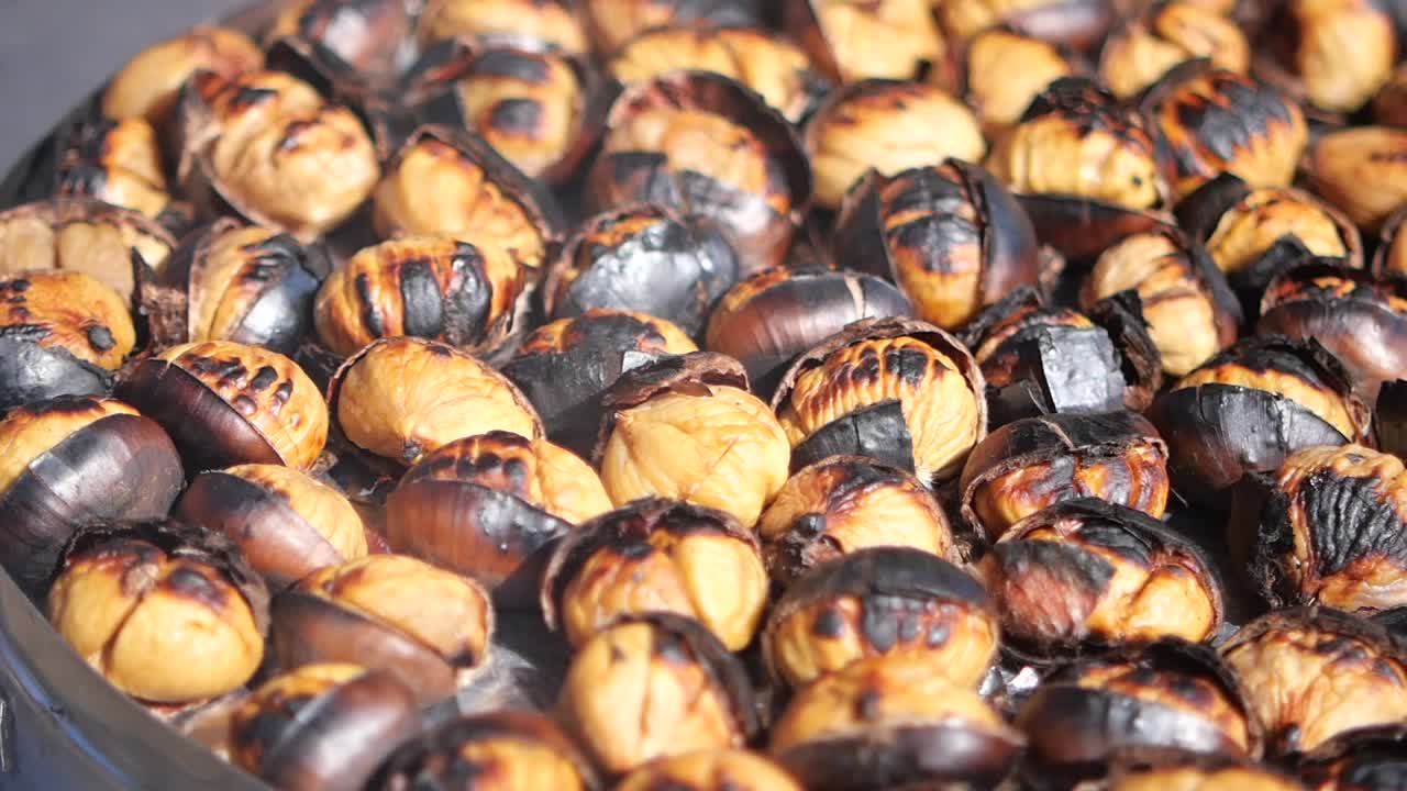 Close-up of numerous roasted chestnuts