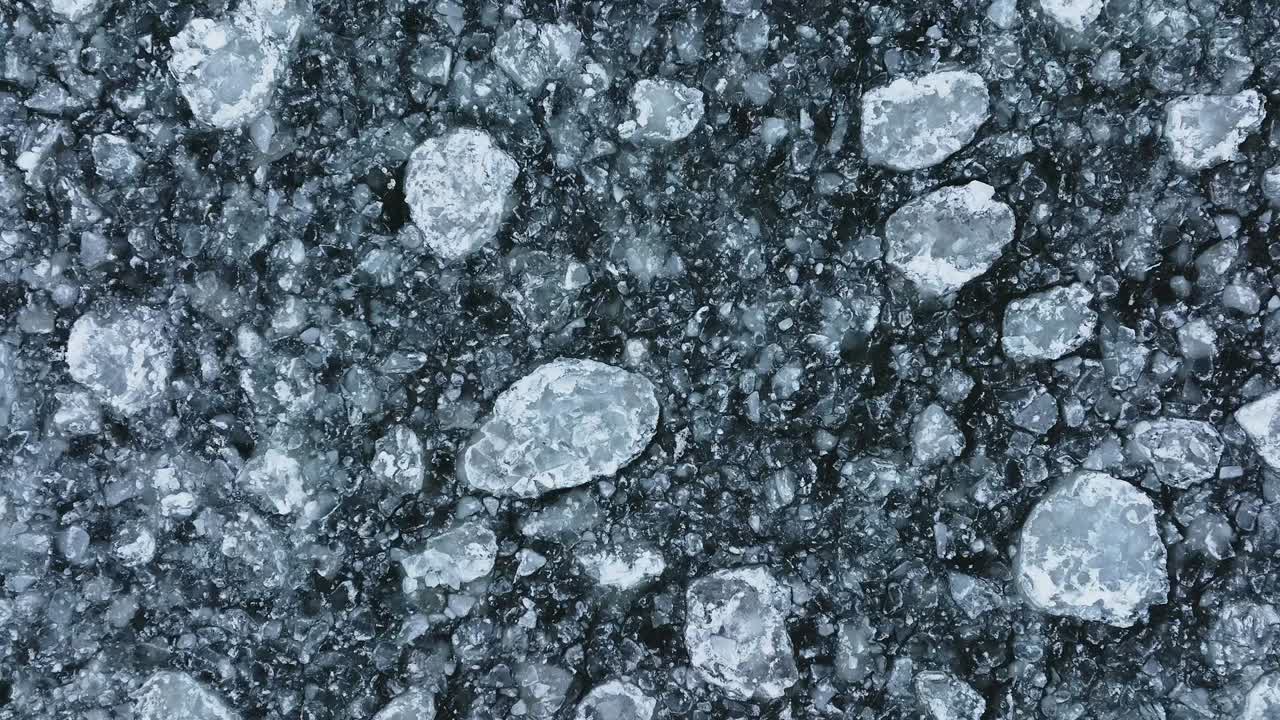 A drone's-eye panorama unveiling the frozen majesty of Lake Michigan's wintry embrace