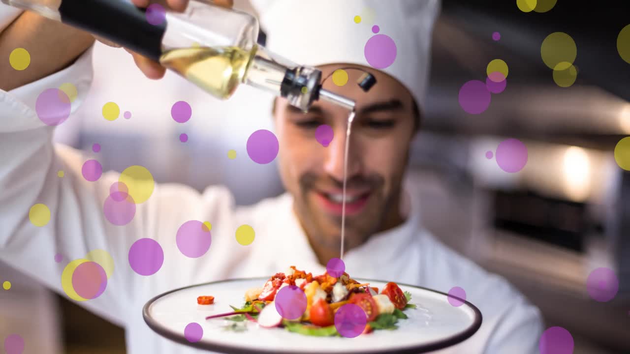 animación de puntos amarillos y púrpuras que caen sobre el cocinero