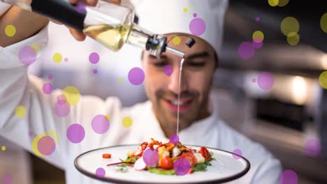 animación de puntos amarillos y púrpuras que caen sobre el cocinero