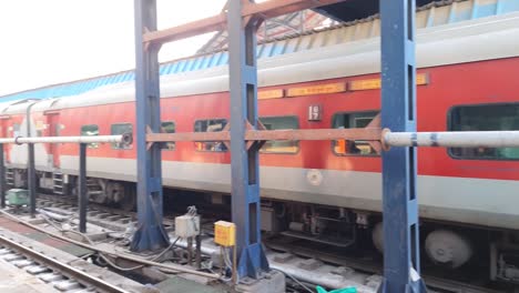 passenger-train-standing-on-track-crossing-each-other-from-opposite-direction-at-morning-video-is-taken-at-new-delhi-railway-station-on-Aug-04-2022