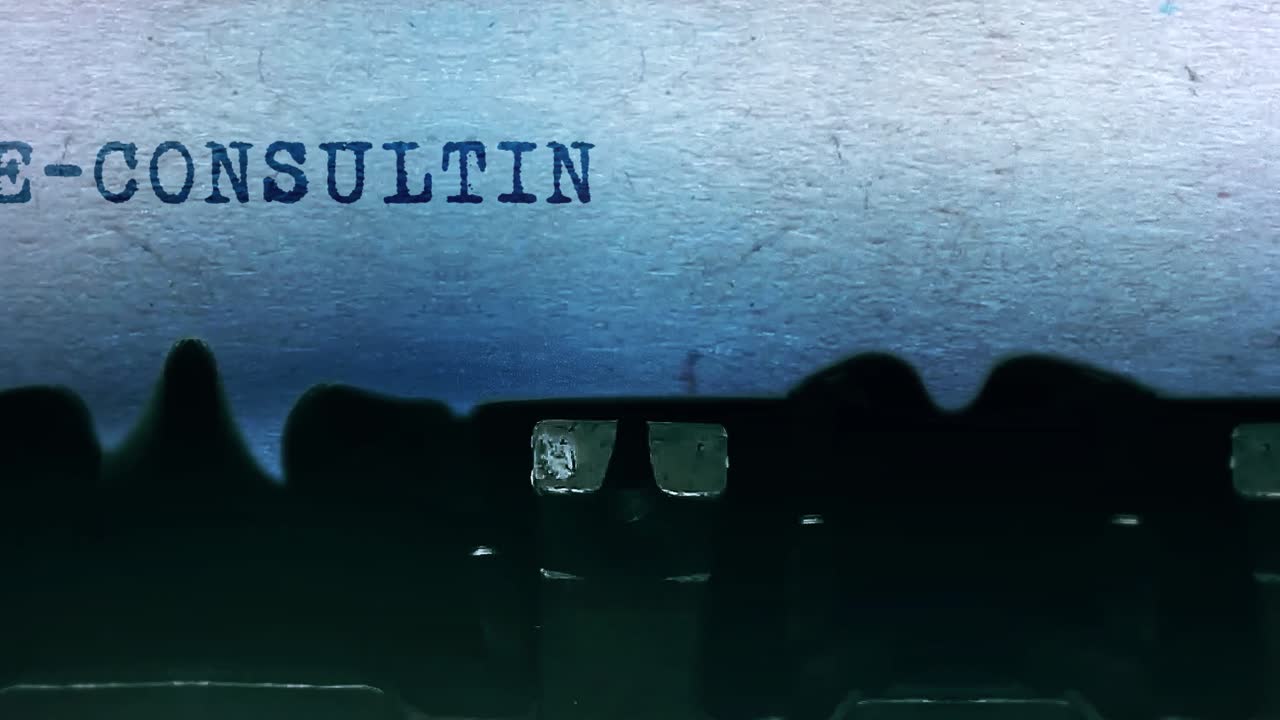 Vintage Typewriter Image with E-Consulting Text