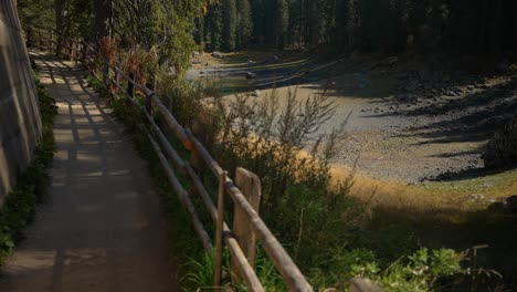 footage of lake lago di carezza in italian dolomites in european alps