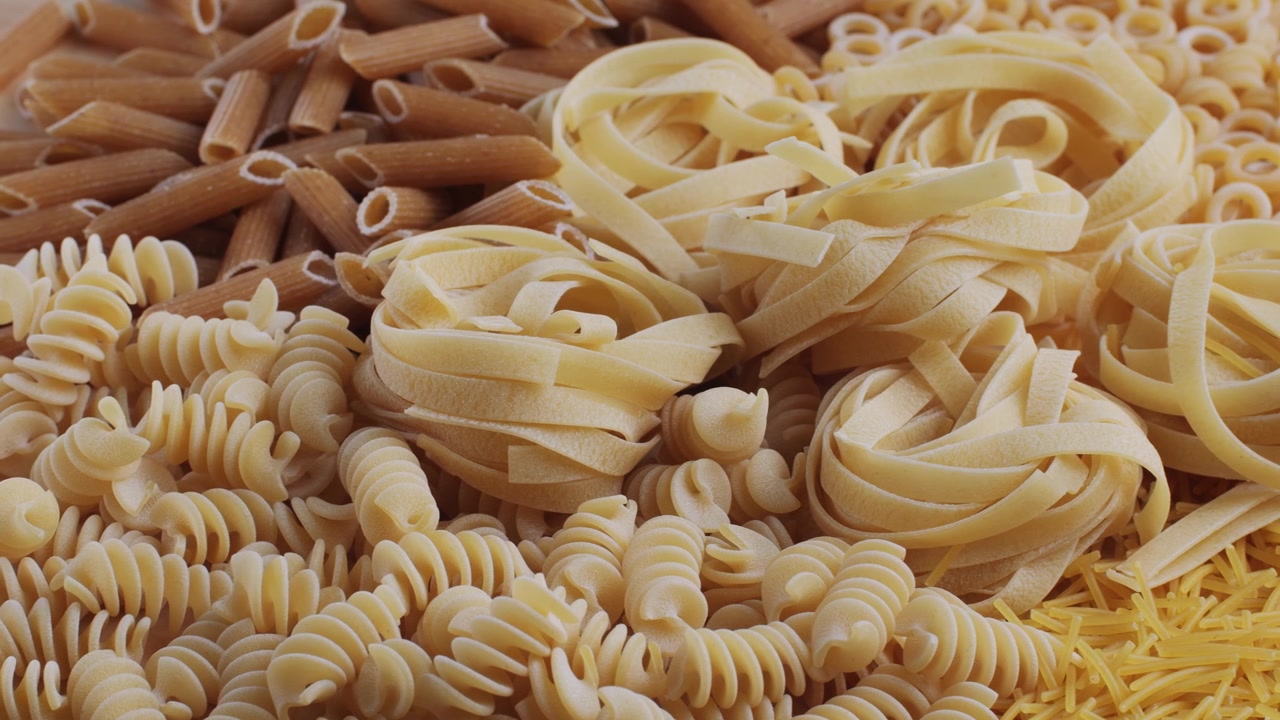 Close-up of Various Uncooked Pasta Types