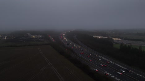 evening traffic gloomy foggy evening m11 motorway essex uk drone,aerial