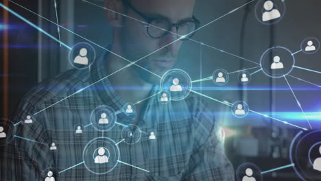 working with digital network connections, man in glasses using animation tools