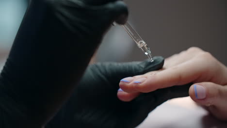 applying nail serum