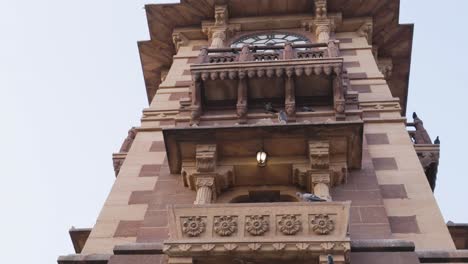 Torre-Del-Reloj-De-Piedra-Roja-Arquitectura-única-En-El-Día-Desde-Diferentes-ángulos-El-Video-Se-Toma-En-Ghantaghar-Jodhpur-Rajasthan-India