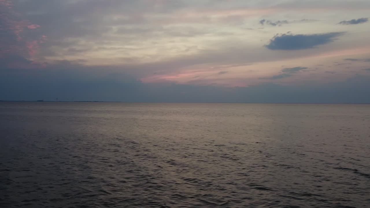 Sunset at Norderhafen (northern harbor) of the Nordstrand peninsula at the Wadden Sea National Park in Schleswig-Holstein, Germany, Europe