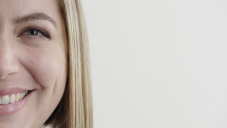 close-up-portrait-attractive-blonde-woman-smiling-happy-satisfaction-caucasian-female-beauty-on-white-background-half-face