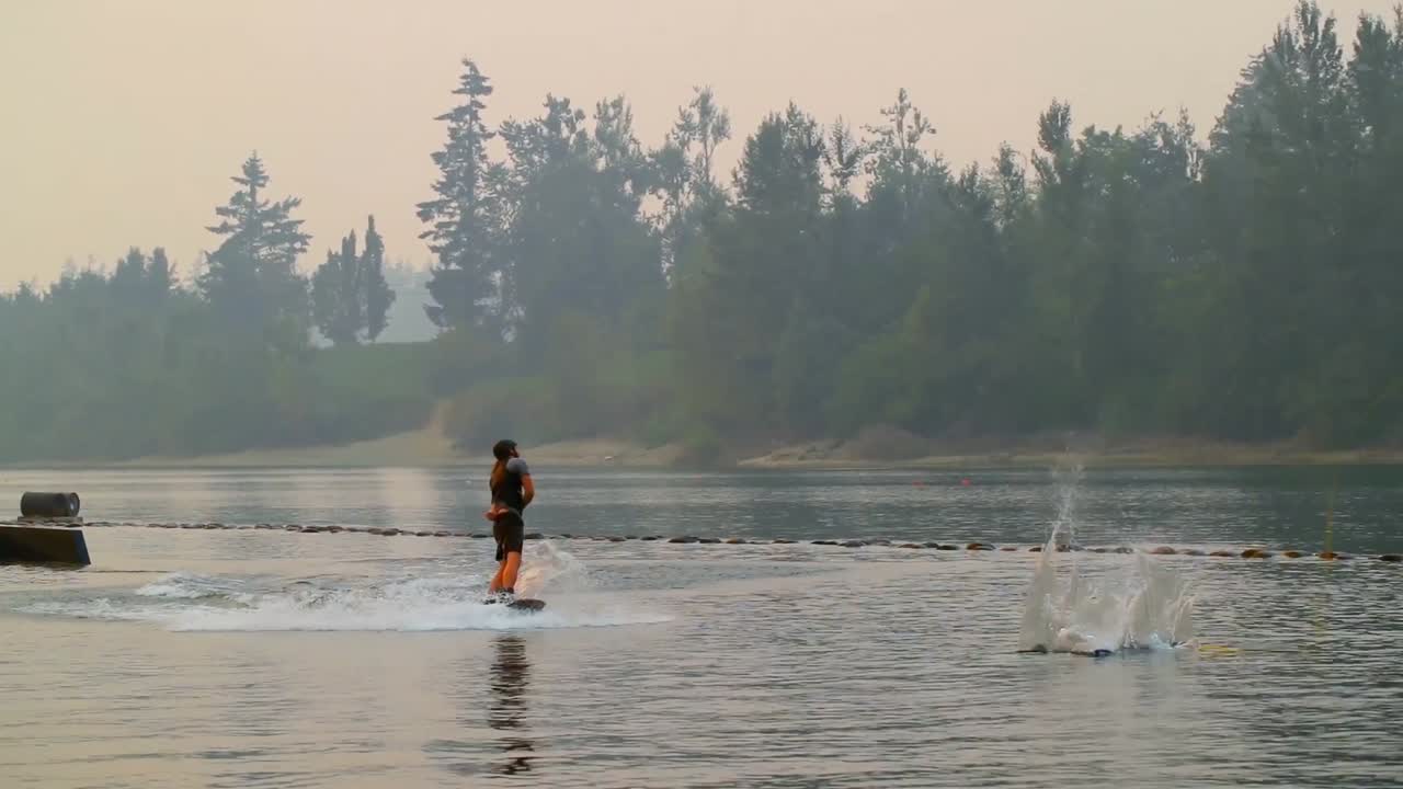 Man wakeboarding in the river 4k