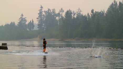 Man-wakeboarding-in-the-river-4k