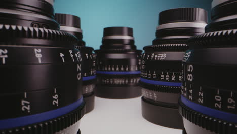 Close-up of multiple professional camera lenses