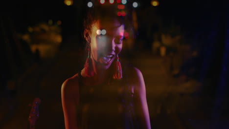 female musician playing guitar on night street under lights, with animated music notes floating