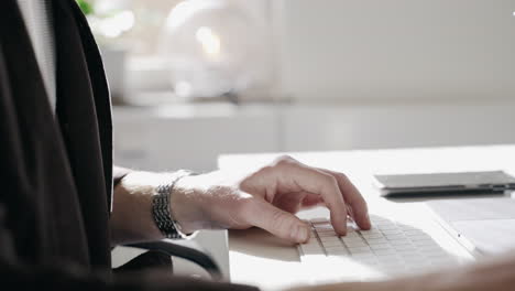 Close-up-fancy-designer-well-dressed-office-worker-typing-keyboard-hand-hands-mouse-computer-designing-websites-coding-editor-editing-macbook-desktop-desk-job-internet-business-ad-agency-agencies-sun