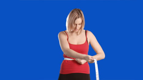 Blue-screen-footage-of-a-woman-working-out