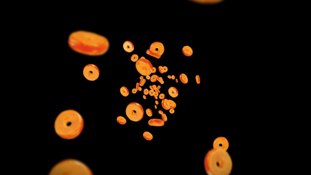 검은색 바탕에 많은 평평한 도을 날리는 도 케이크, 과자, 디저트, 도 회전의 3d 애니메이션, 루프 애니메이션.