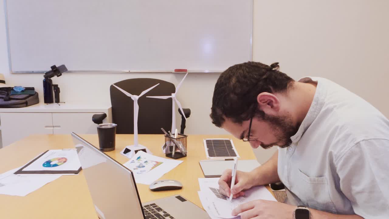 Man working on alternative energy projects