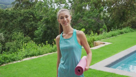 woman with a yoga mat