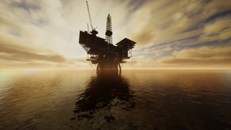 offshore jack up rig in the middle of the sea at sunset time