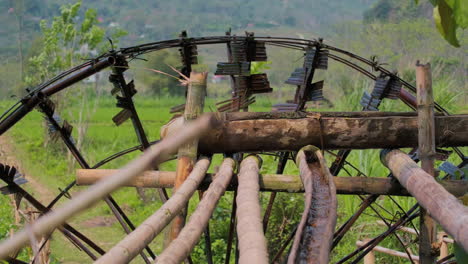 water wheels for traditional farming irrigation in pu luong, northern vietnam. close-up shot