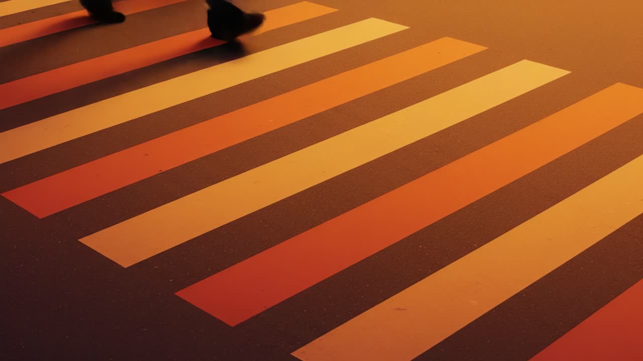 Stunning Urban Crosswalk: Vibrant Sunset Stripes Illuminate the Roadway, Capturing the Essence of Modern Transportation in a Metropolis