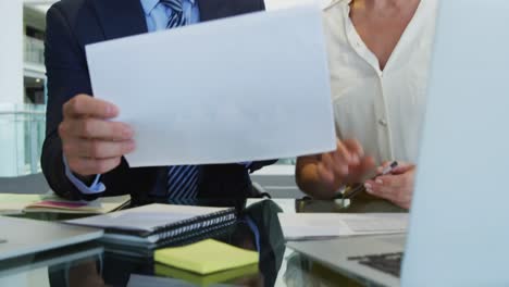 Young-business-people-talking-in-a-modern-office