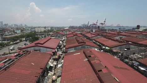 Aerial-of-poor-people-housing-in-Tondo-Manila,-Philippines
