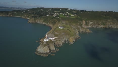 aerial view of beautiful bailey lighthouse on a cliff in howth, ireland