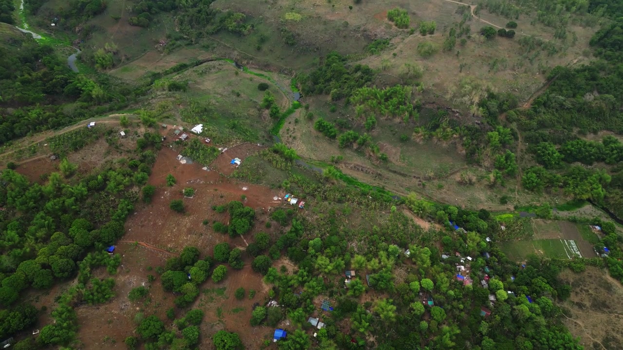 Cinematic aerial footage of a secluded dome cabin in Rizal Province near Tanay and Pililla showing the connection between architecture and tropical nature.