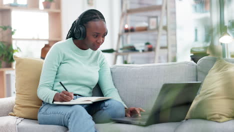 black woman, laptop and listening to music