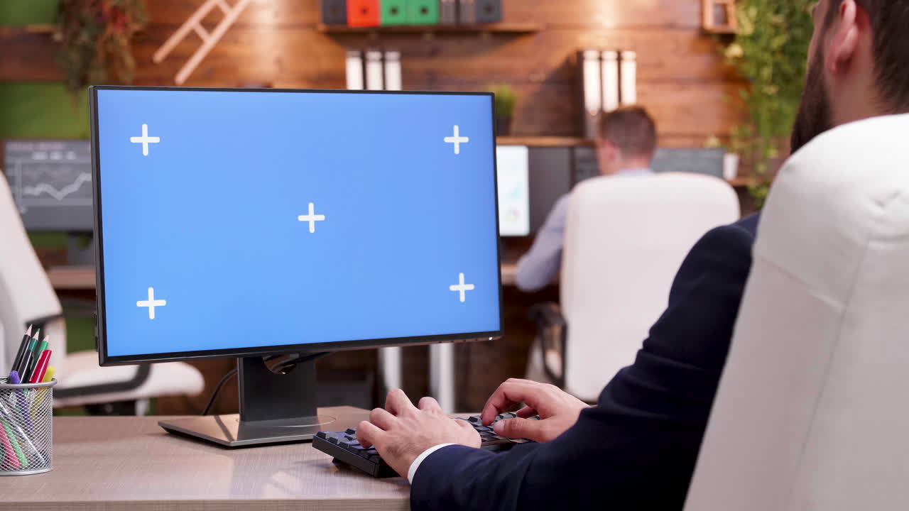 Computer screen with blue screen in an office