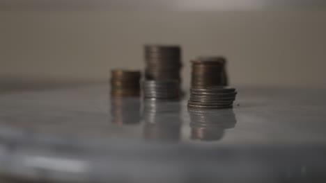 a pile of coins, various focuses pulling