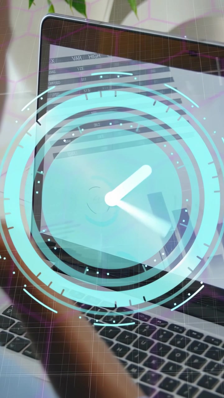 HUD appearing on laptop rotating and pulsing while user's hand typing revealing dashboard data