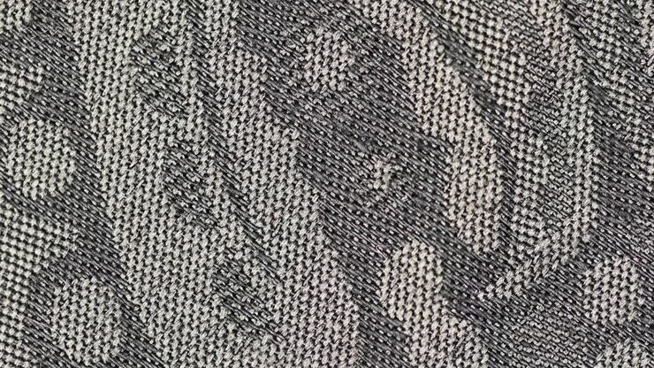 Macro Shot Of Printed Grey Woolen Fabric