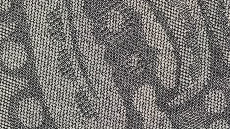 macro shot of printed grey woolen fabric