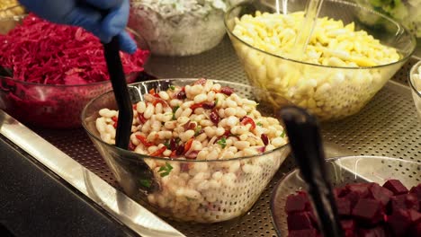 salad bar with beans and other vegetables