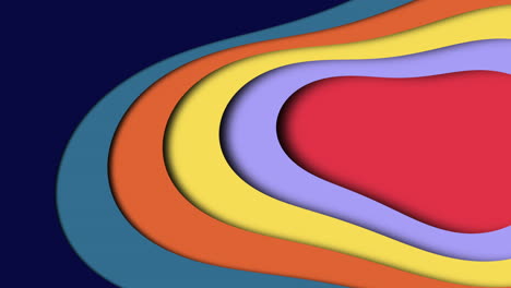 colorful shapes arranged in a heart formation against a blue background, creating a cheerful and vibrant visual representation