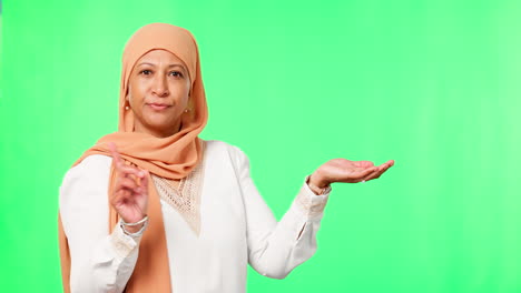 Serious,-muslim-woman-and-hand-presentation