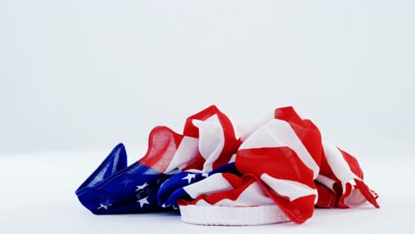 american flag falling on table