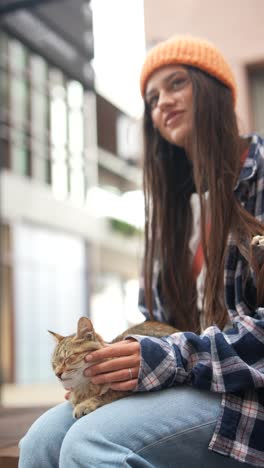 young woman and a cat