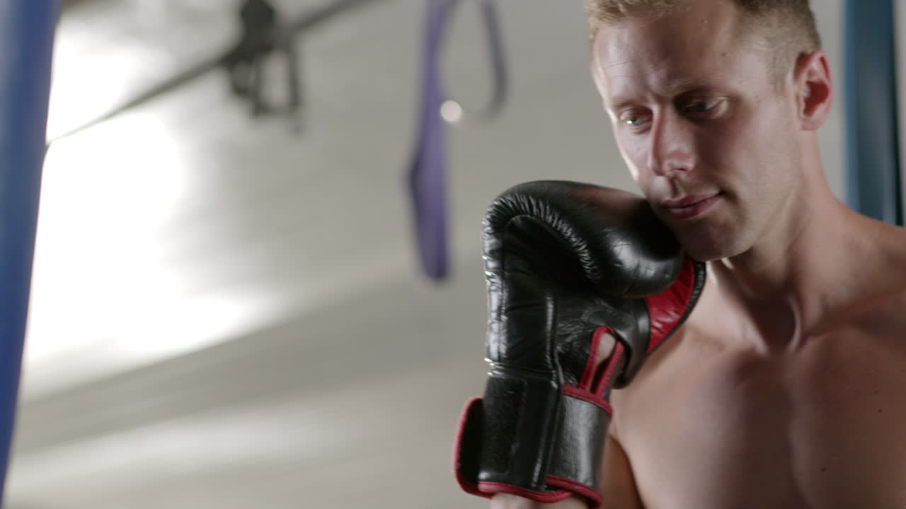 A man boxing in a gym