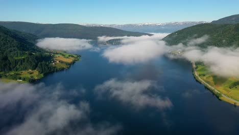 aerial footage beautiful nature norway over the clouds.