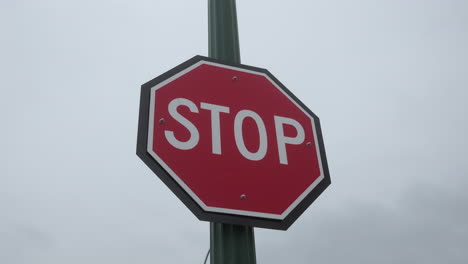 slow motion shot of a stop sign, traffic sign