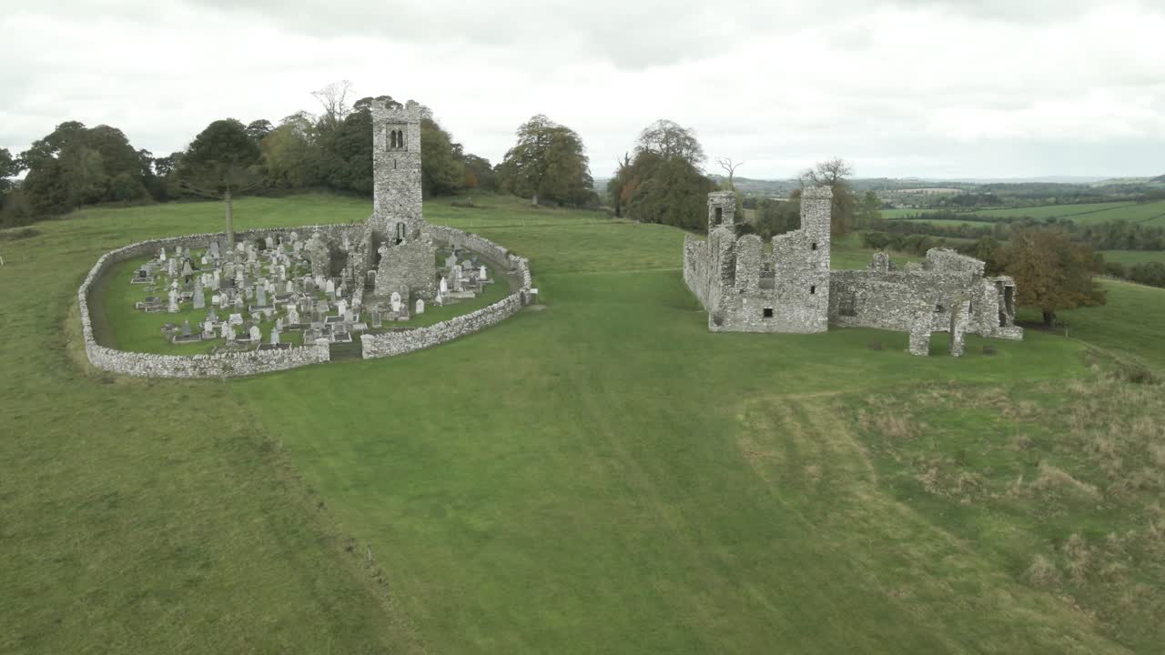 Franciscan College Ruins And The Ruins Of The Friary Church On The Hill Of Slane In County Meath, Ireland. - aerial shot