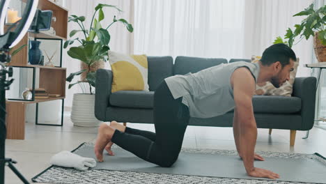 Asian-man,-yoga-and-pilates-workout-in-living