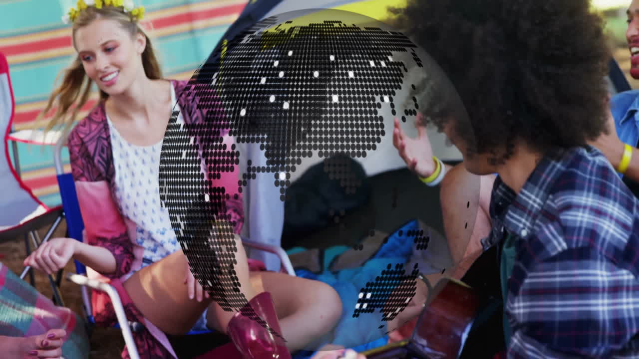 People enjoying music at campsite with digital globe animation overlay