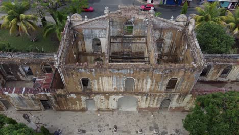 aerial: historic old colonial building ruin in santa ana, el salvador