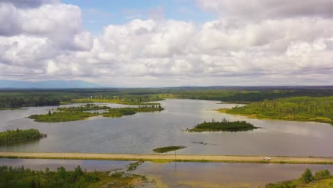 scenic aerial view: cars on cariboo highway near 100 mile house