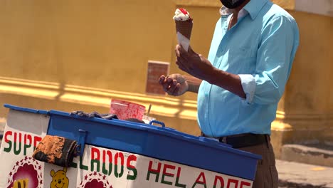 Ice cream seller in latin city. Guatemalan ice cream vendor